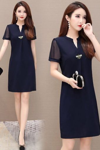 Những nguyên tắc vàng khi chọn váy đầm tuổi 50 - váy dành cho người mập bụng